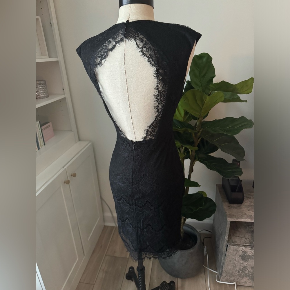 Beautiful black classy dress with open back